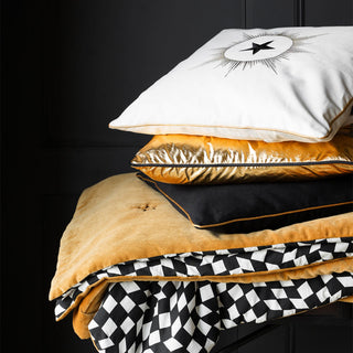 15-year anniversary collection image of cushions and throw