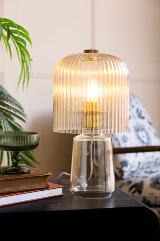 A champagne-coloured  ribbed glass table lamp