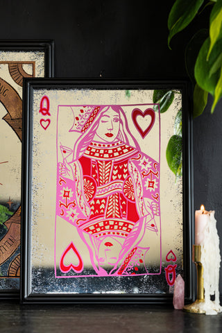 A decorative mirror featuring the Queen Of Hearts playing card
