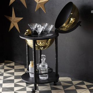 A drinks trolley shaped as a gold disco ball.
