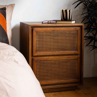 Beautiful pink diamond checkered bedside table in a bedroom setting.