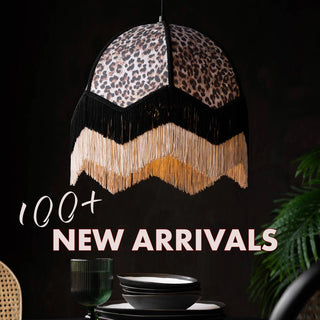 A pink bedside table witht the text: 100+ new arrivals.