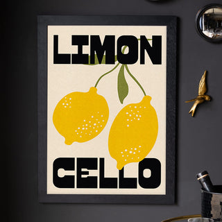 The Limoncello Art Print displayed on a black wall, styled with a convex mirror, ornament and drinks trolley with accessories.