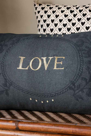 Close-up image of the Embroidered Love Cotton Cushion