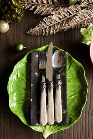 Image of cabbage leaf page on a Christmas table setting