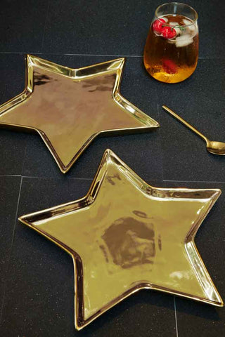 Lifestyle image of the Set of 2 Gold Star Side Plates