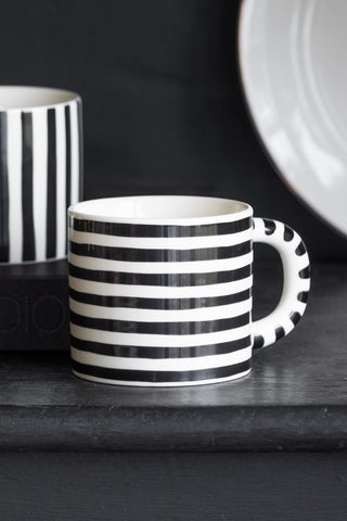 Close-up image of the Set Of 2 Monochrome Stripey Mugs