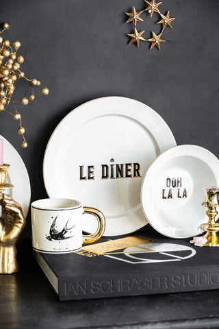 Lifestyle image of the White Parisian Bistro Set of 4 Dinner Plates