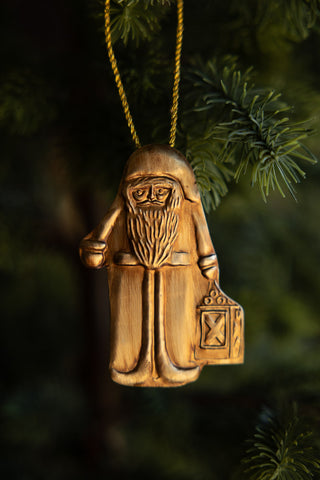 Lifestyle image of the Antique Gold Santa Christmas Tree Decoration