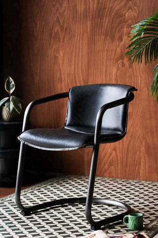 Lifestyle image of the Antique Slate Leather Chair