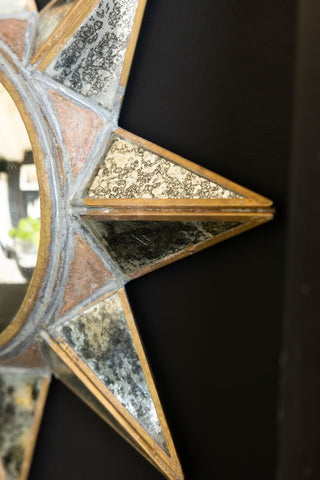 Close-up image of the Antiqued-Gold Sun Convex Wall Mirror
