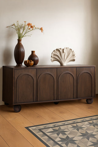 Lifestyle image of the Arc Detail 4-Door Mango Wood Sideboard
