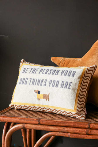 Lifestyle image of the Be The Person Your Dog Thinks You Are Cushion