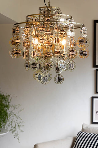 Lifestyle image of the Beautiful Layered Shell Disc Chandelier