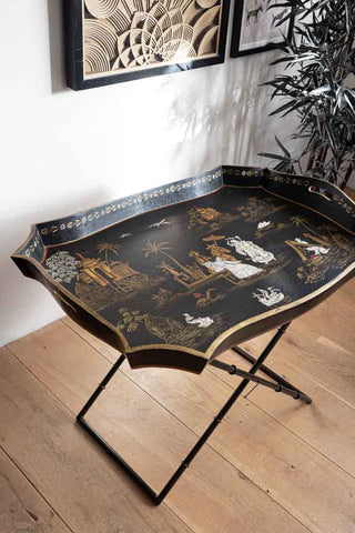Lifestyle image of the Black Chinoiserie-style Deco Tray Table
