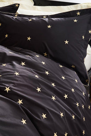 Close-up image of the Black Falling Star Duvet Cover and Pillow Case Set