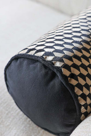 Close-up image of the Black Geo Bolster Cushion.