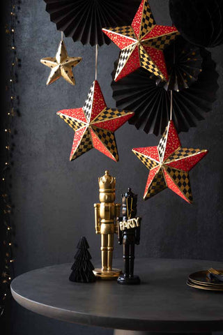 Detail image of the Black, Gold & Red Checkered Star Christmas Decoration