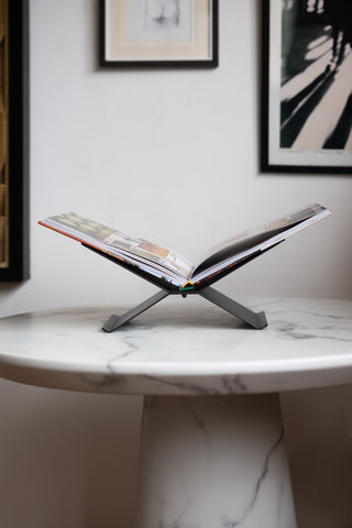 Image of the Black Metal Book Stand with a book