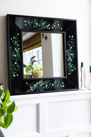 Lifestyle image of the Black & Floral Wooden Framed Mirror
