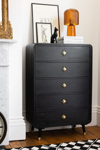 Lifestyle image of the Black & Gold Ringo Chest of Drawers