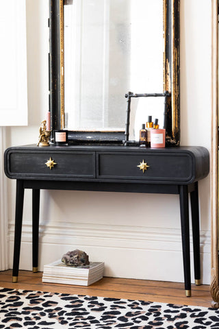 Lifestyle image of the Black & Gold Ringo Console Table