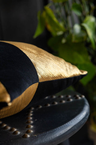Detail image of the Black & Gold Star Cushion