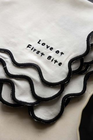 Close-up image of the Set of 4 Black & White First Bite Napkins
