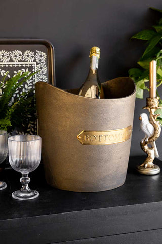 Lifestyle image of the Bottoms Up Champagne Bucket