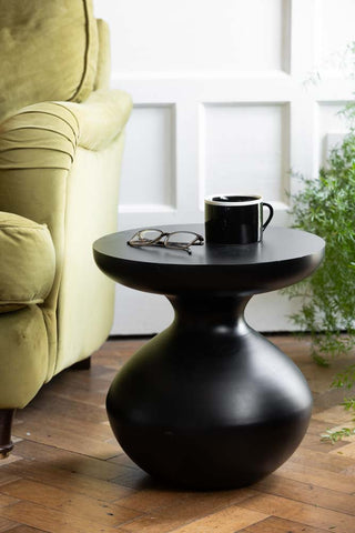 Image of the Bowl-Shaped Base Black Side Table in a lounge