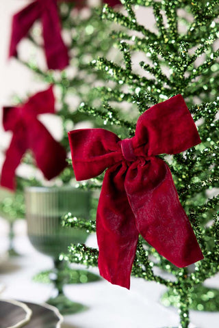 Close-up image of the Burgundy Velvet Clip-On Christmas Bow