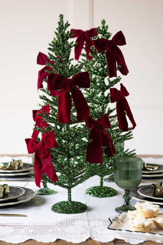 Lifestyle image of the Burgundy Velvet Clip-On Christmas Bow