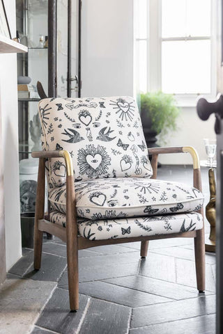 Lifestyle image of the Celeste Hearts and Flowers Natural Accent Chair