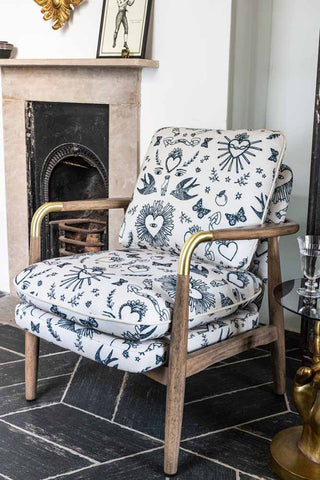 Image of the Celeste Hearts and Flowers Natural Accent Chair in a living room setting