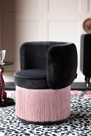 Lifestyle image of the Charcoal & Pink Tassel Accent Chair