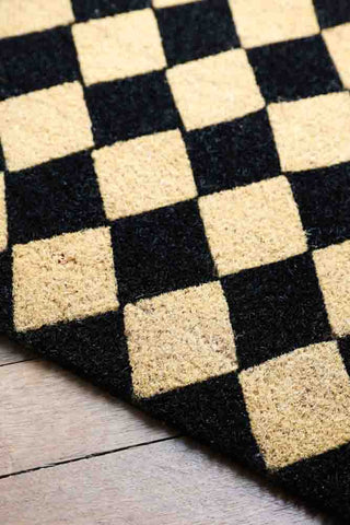 Close-up of the Checkered Patterned Doormat.