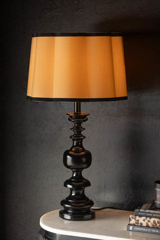 Image of the Parchment & Black Scalloped Lampshade on a table lamp