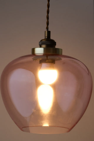 Detail image of the Easyfit Pink Glass Ceiling Light Shade with bulb switched