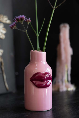 Lifestyle image of the Small Pink Ceramic Vase With Lips