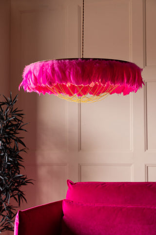 Lifestyle image of the Fabulous Feather Ceiling Light Shade - Hot Pink