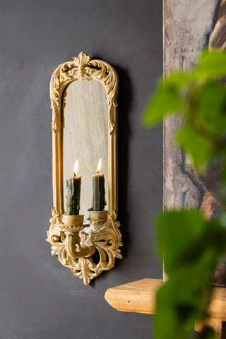Lifestyle image of the Filigree Framed & Mirrored Candle Wall Sconce