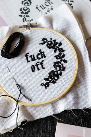 Close-up image of the Fuck Off Floral Sewing Kit