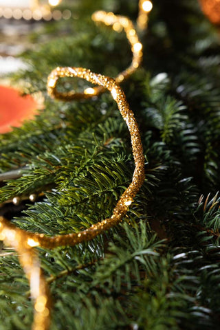 Close-up image of the Gold Beaded Garland with Fairy Lights