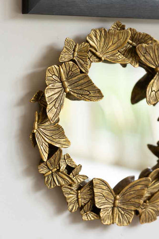 Close-up image of the Gold Butterfly decorative Mirror.