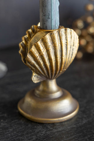 Close-up image of the Gold Clam Shell Candlestick Holder