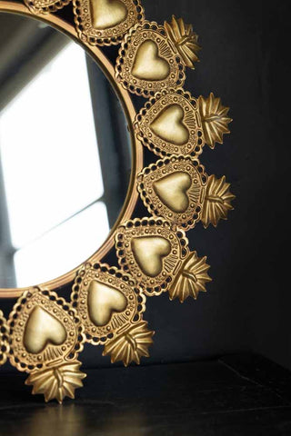 Close-up image of the Gold Milagro Heart decorative Mirror.