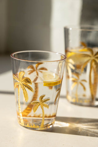 Lifestyle image of the Gold Palm Tumbler