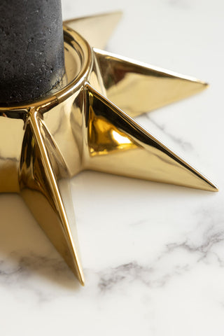 Close-up image of the Gold Star Candle Holder