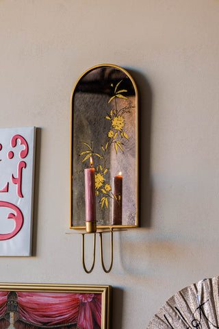 Lifestyle image of the Gold & Foxed Mirror Floral Candle Wall Sconce