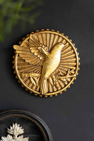 Lifestyle image of the Golden Flying Bird Wall Decor